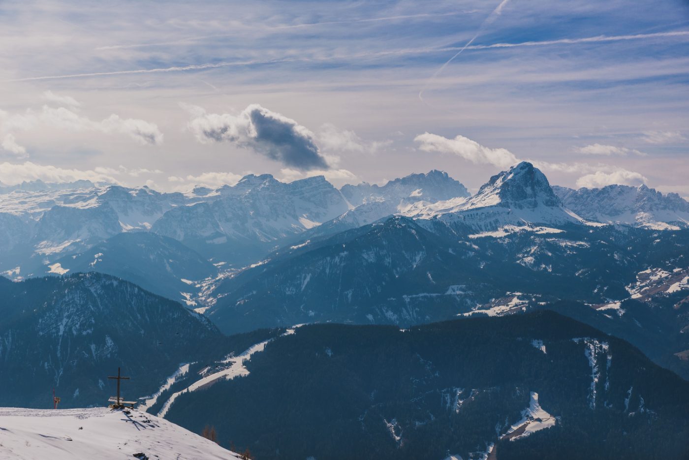Stunning view of a snow-capped mountain range under a clear blue sky, ideal for nature enthusiasts.
